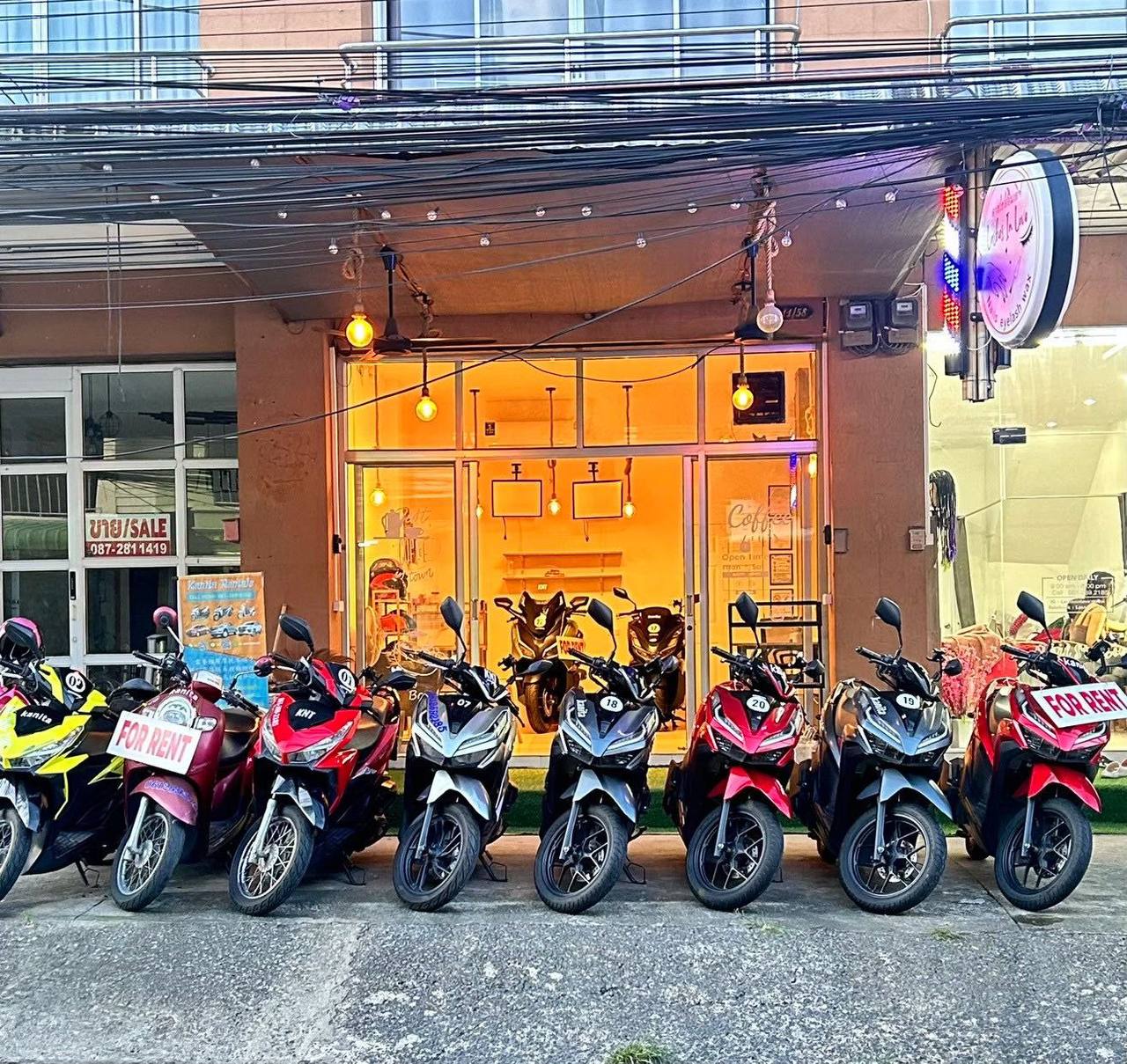 KNT Samui Rentals storefront with fleet lined up